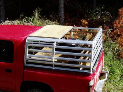 Two peice lid shown in open position, a great idea if you have to cart somthing tall in the back, you can do so without taking the crate off the deck.